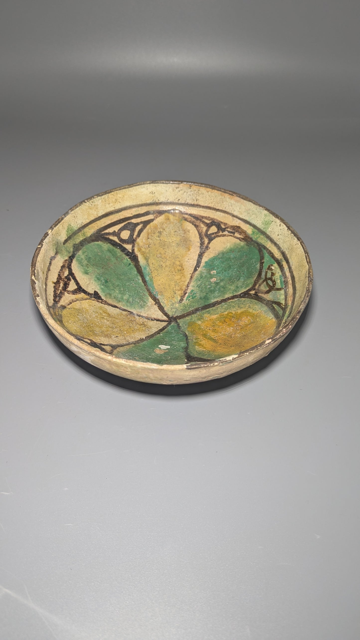 Early Islamic Persian Polychrome Buff-Ware Bowl with Radial Floral Decoration, Probably Nishapur, 9t