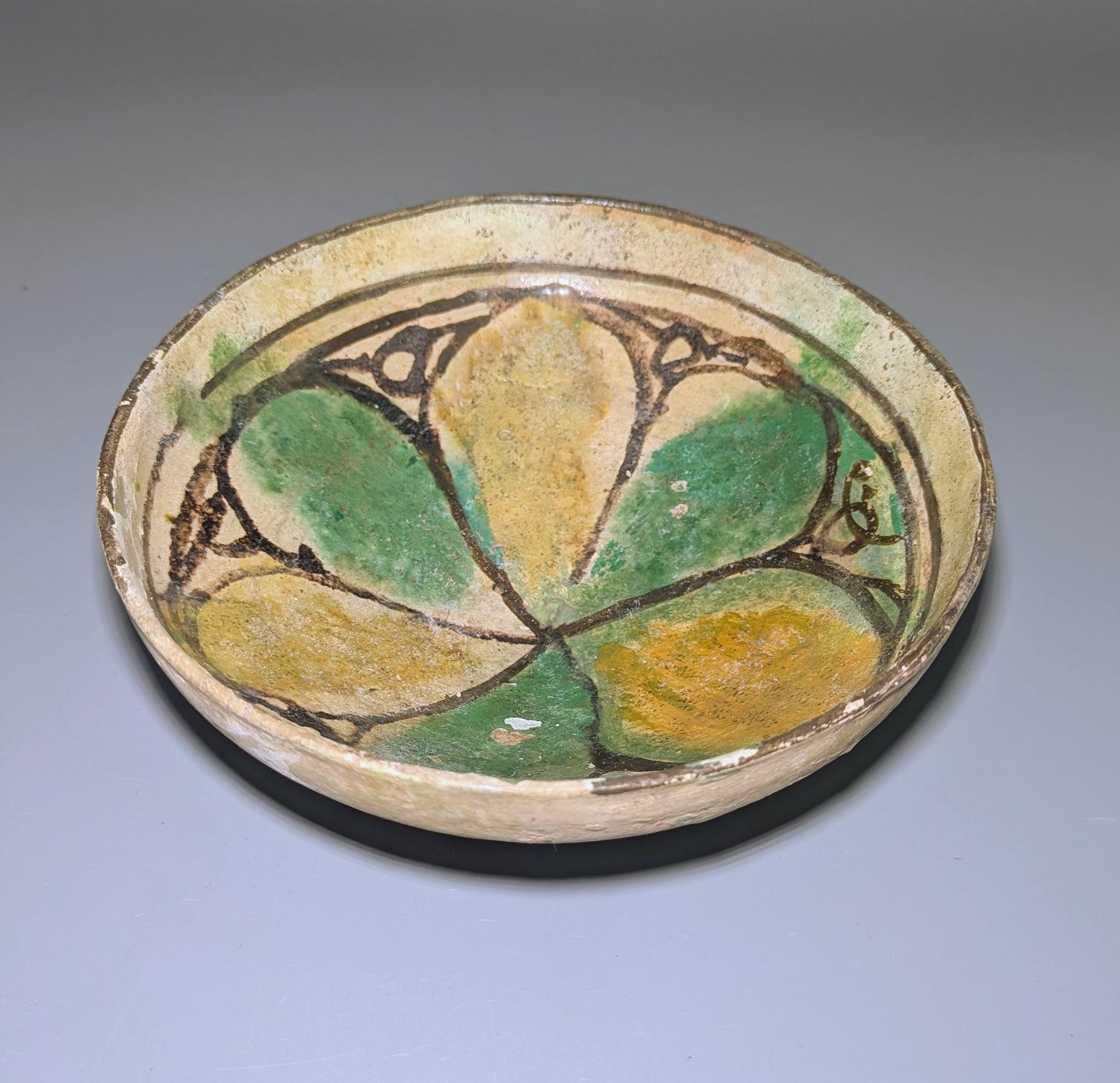 Early Islamic Persian Polychrome Buff-Ware Bowl with Radial Floral Decoration, Probably Nishapur, 9t