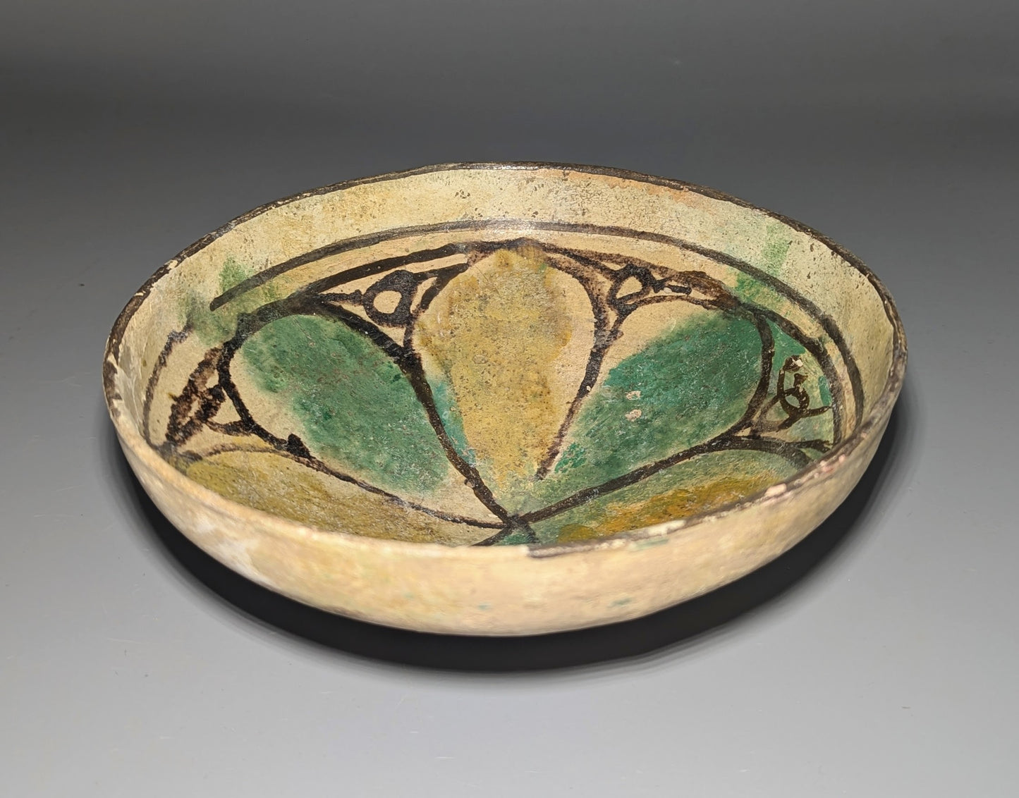 Early Islamic Persian Polychrome Buff-Ware Bowl with Radial Floral Decoration, Probably Nishapur, 9t