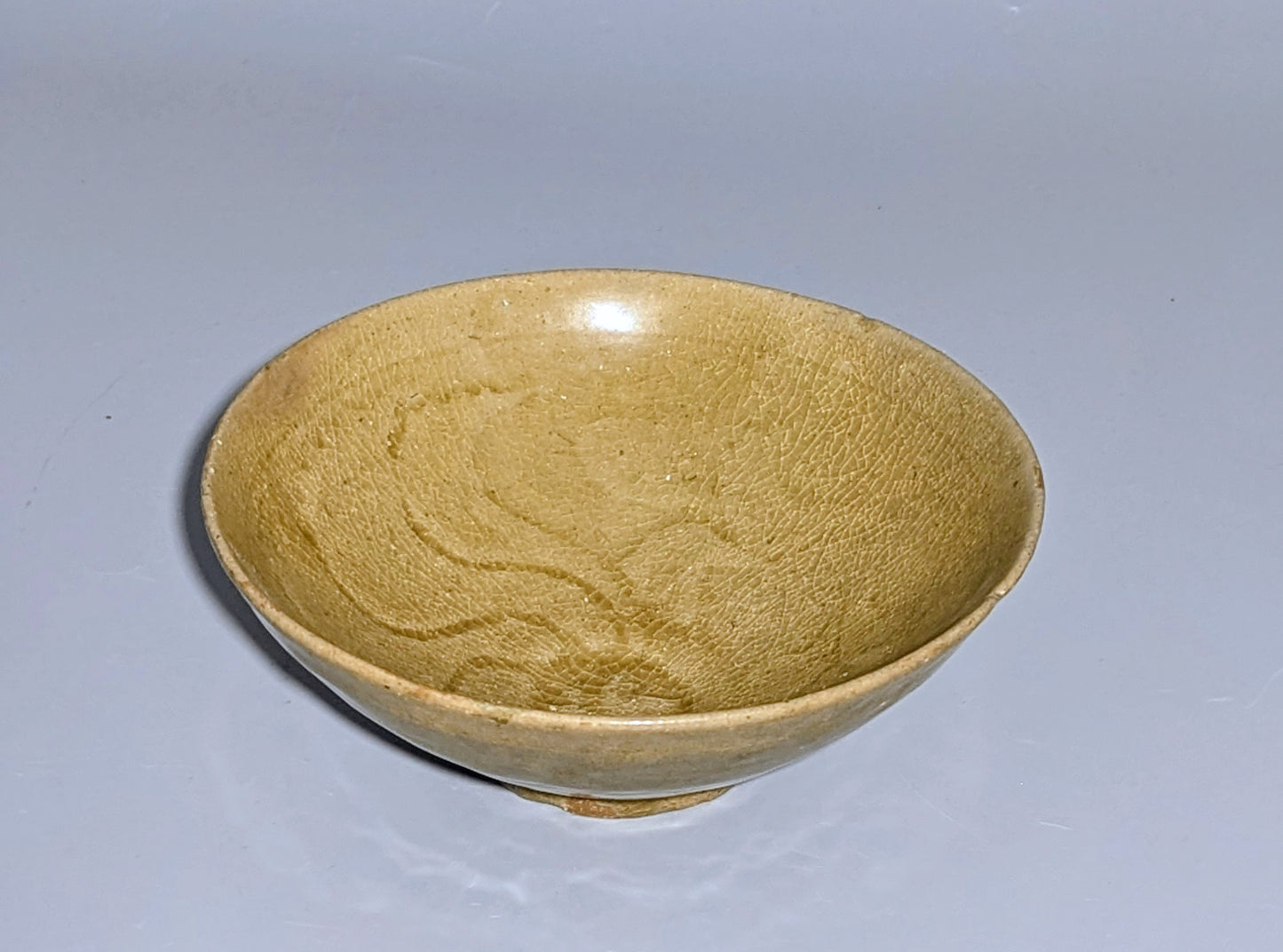 Korean Goryeo Celadon Bowl with Incised Lotus Scroll Decoration