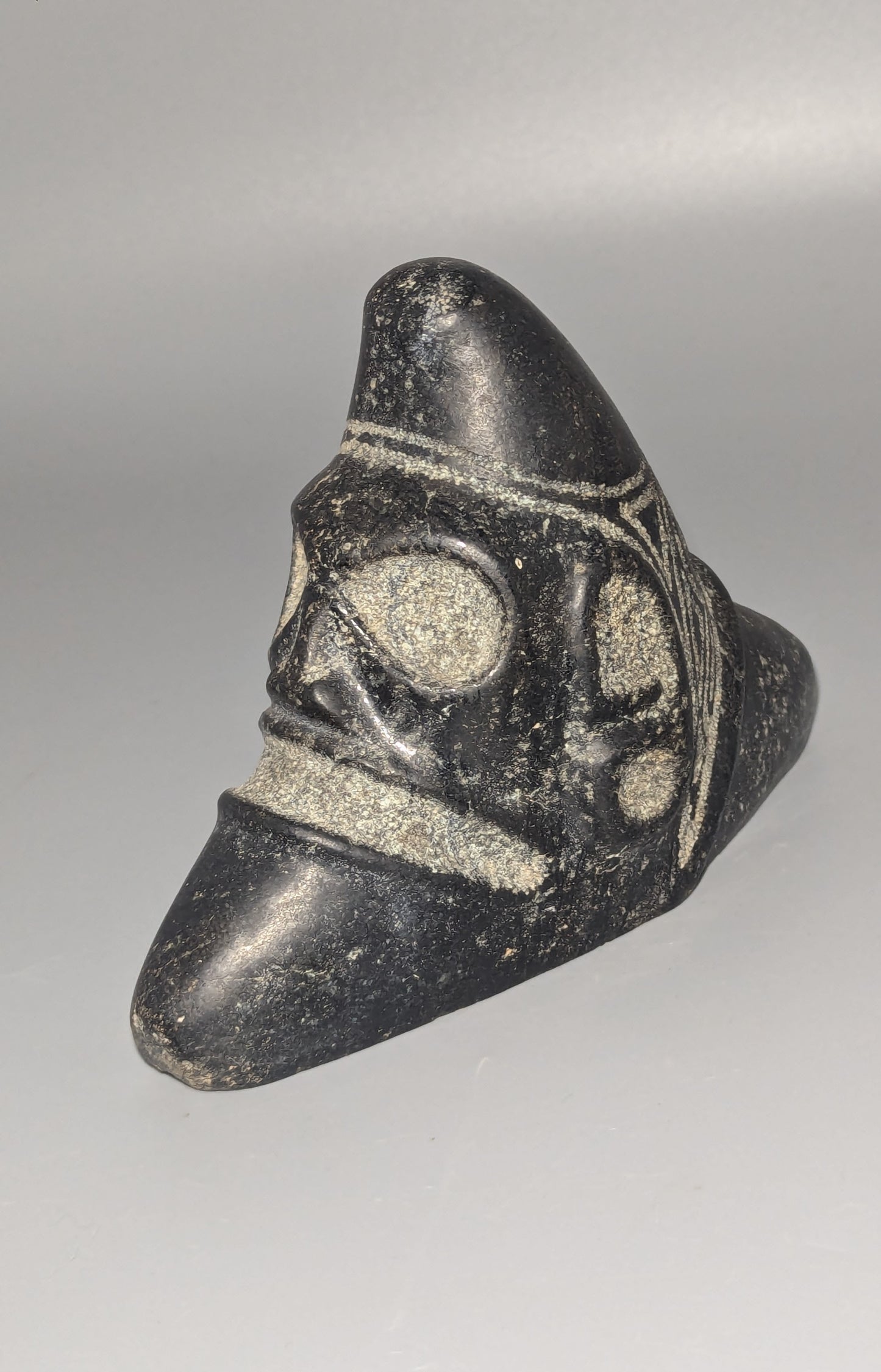 Taíno Carved Black Stone Anthropomorphic Zemí Three-Pointer (Trigonolito), Greater Antilles