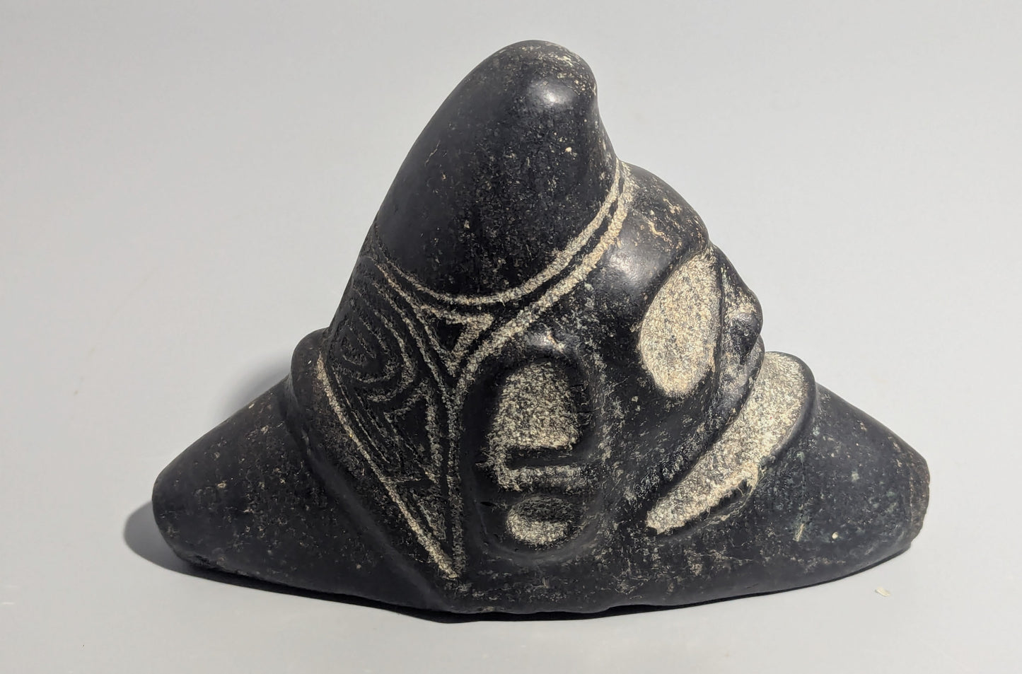 Taíno Carved Black Stone Anthropomorphic Zemí Three-Pointer (Trigonolito), Greater Antilles